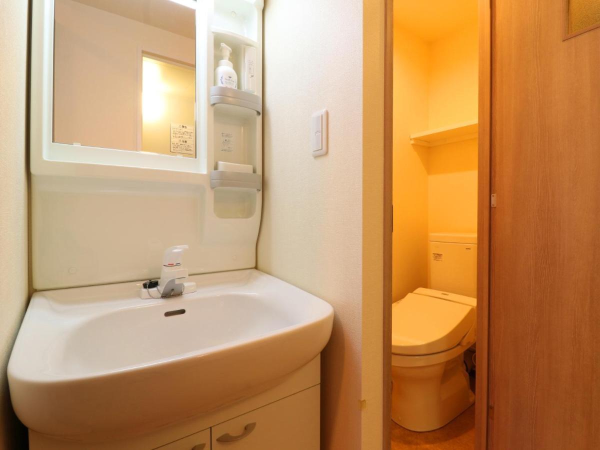 Hotel Asahi Grandeur Fuchu Buitenkant foto