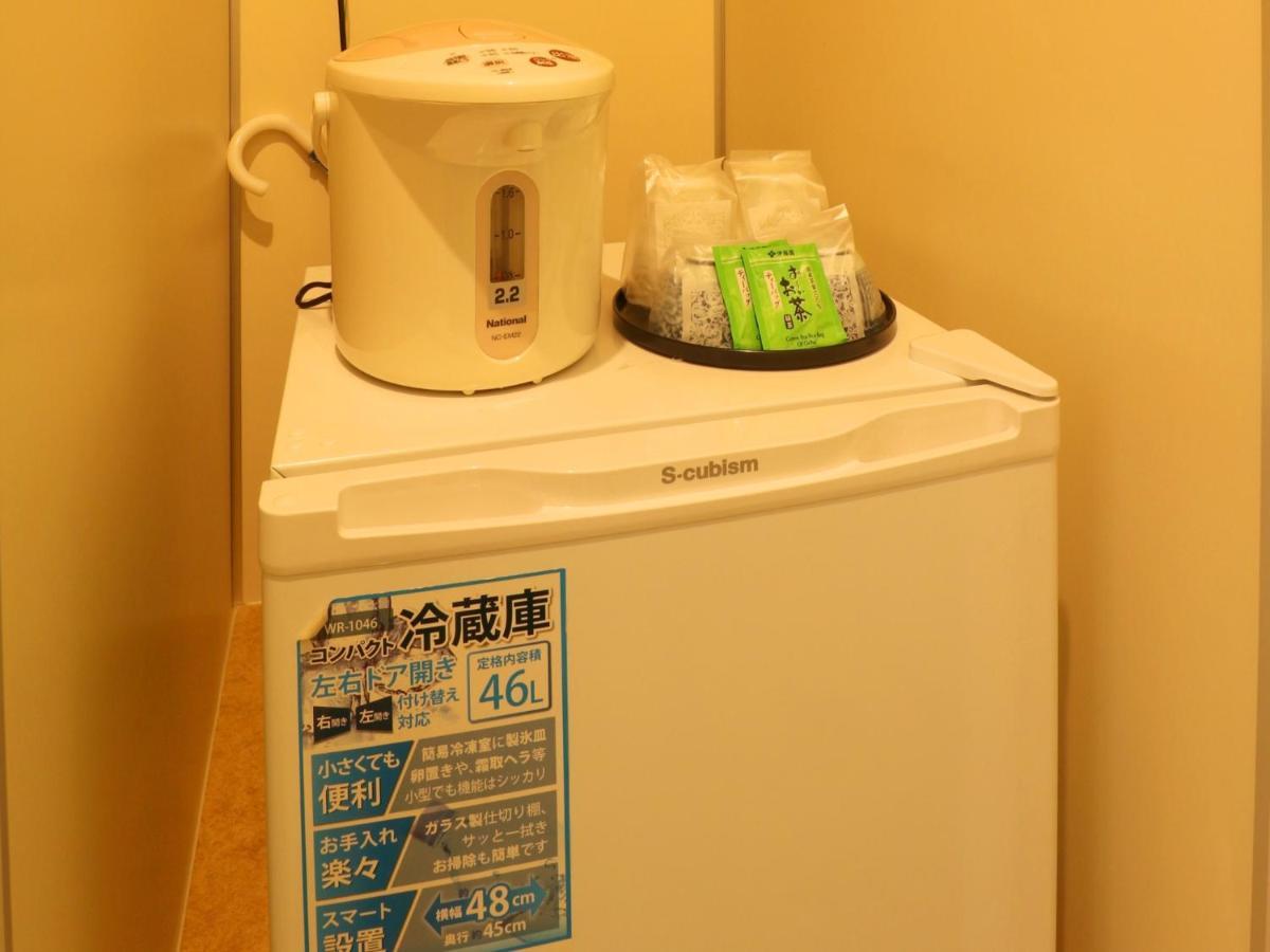 Hotel Asahi Grandeur Fuchu Buitenkant foto
