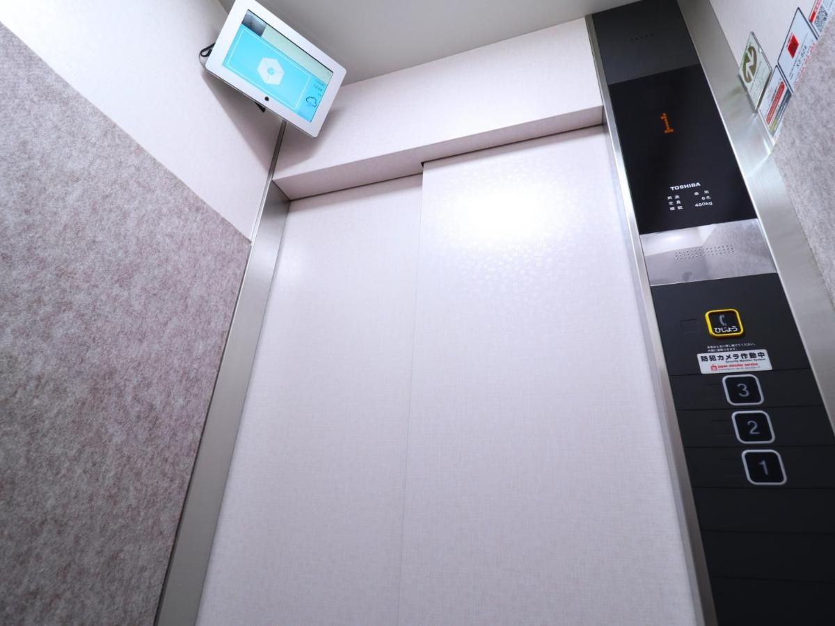 Hotel Asahi Grandeur Fuchu Buitenkant foto
